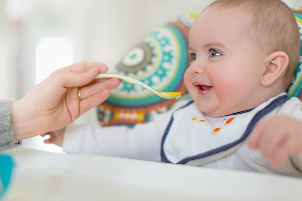 Cute baby eating puree.jpeg